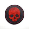 Red skull patch with green background by Airsoft Direct