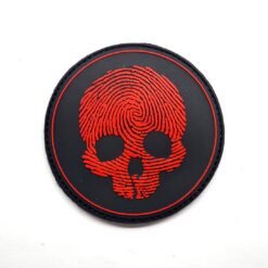 Red skull patch with green background by Airsoft Direct