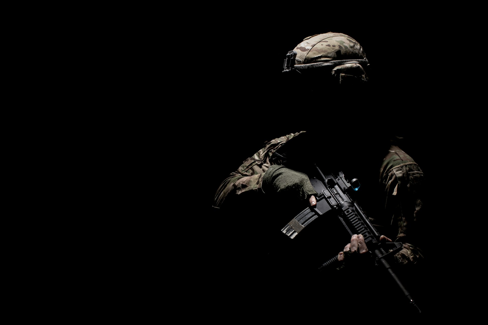 A soldier holding an airsoft rifle