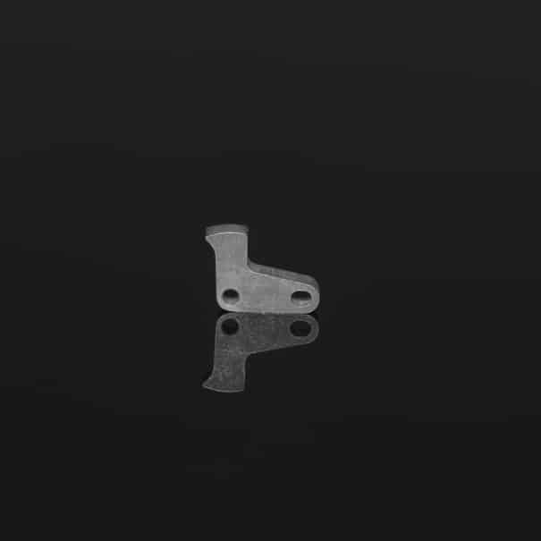 Silverback SRS steel piston sear – CNC machined component, left-side detail view